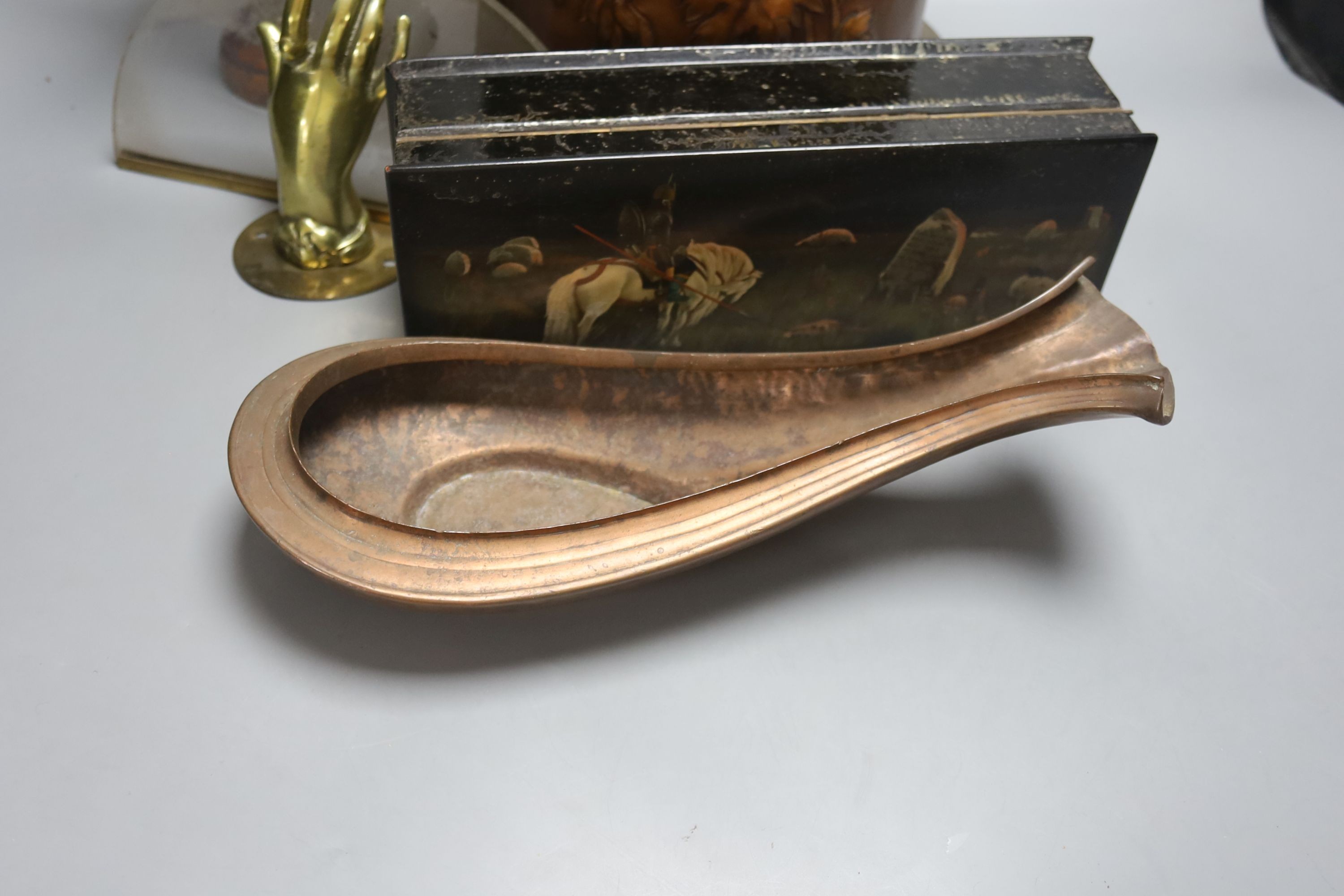 A Russian papier mache box, 26.5cm, an embossed leather stick stand, a Persian painted wood vase, metalware etc